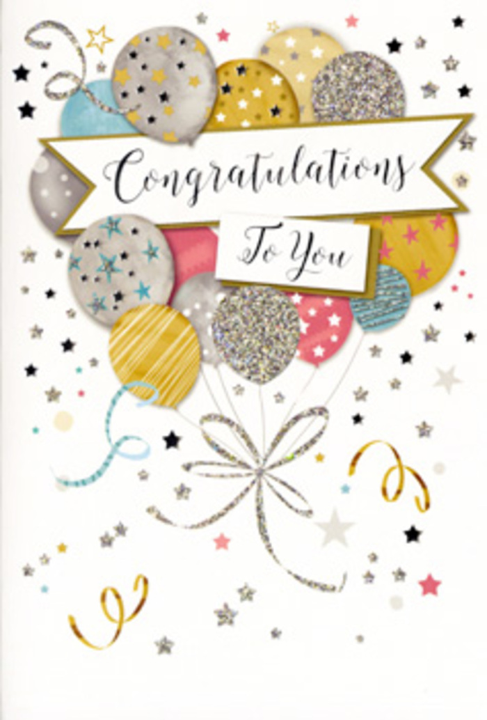The image shows a sophisticated congratulations card propped upright, its artwork transforming the flat surface into a festive sky of balloons and confetti, reminiscent of a special gathering after work along Upminster High Street. A generous cluster of balloons dominates the centre, their rounded shapes rendered in a palette of warm metallic gold, cool silver, soft champagne, gentle sky blue, dusty pink, and light grey. Close inspection reveals each balloon decorated differently: some are filled with tiny gleaming stars, others wrapped in slim glittery stripes or dotted with specks of sparkling pigment, creating the impression of fine, raised detail you might feel when you trace the design with your fingertips. These balloons are held together by slim, curling ribbons in printed gold and silver, twisting and looping downward in relaxed, flowing lines. Cutting across the arrangement is a gently curved banner, like a ribbon unfurling mid-air, bearing the words Congratulations To You in beautifully styled script. The lettering feels carefully considered, like the message you choose when you want to express genuine admiration and joy. Surrounding this focal point, the pale background is softly scattered with tiny stars, dots, and loose ribbon curls, echoing the carefree atmosphere of a party at a local Upminster venue once the toasts have been made. The overall impression is one of polished celebration-elegant yet light-hearted-much like the way a florist pairs a thoughtful card with a fresh bouquet for exam results, a new job, or a promotion. The design feels universal but personal, as though it was created specifically to honour one shining moment in someone's life.